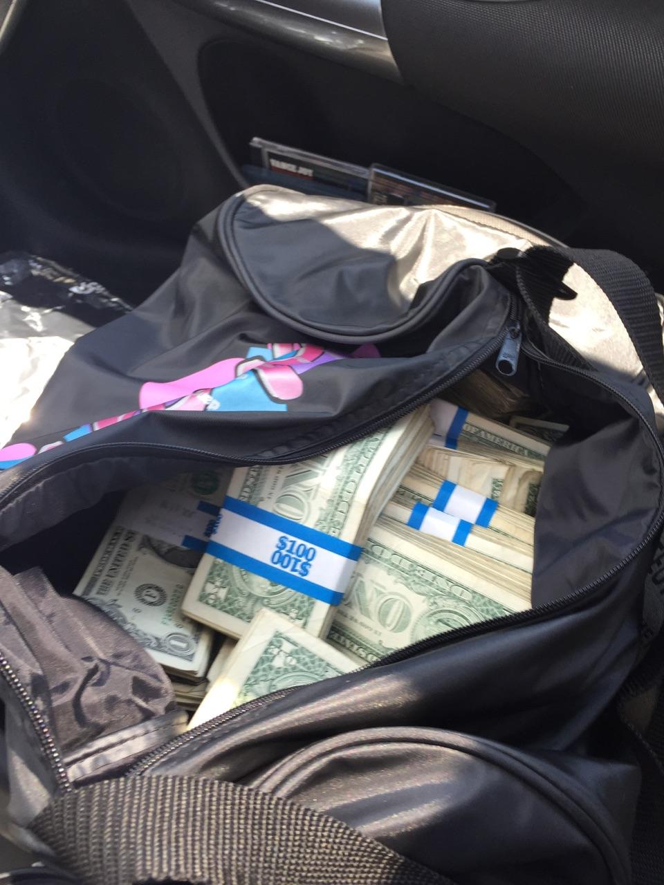 real money in duffle bag
